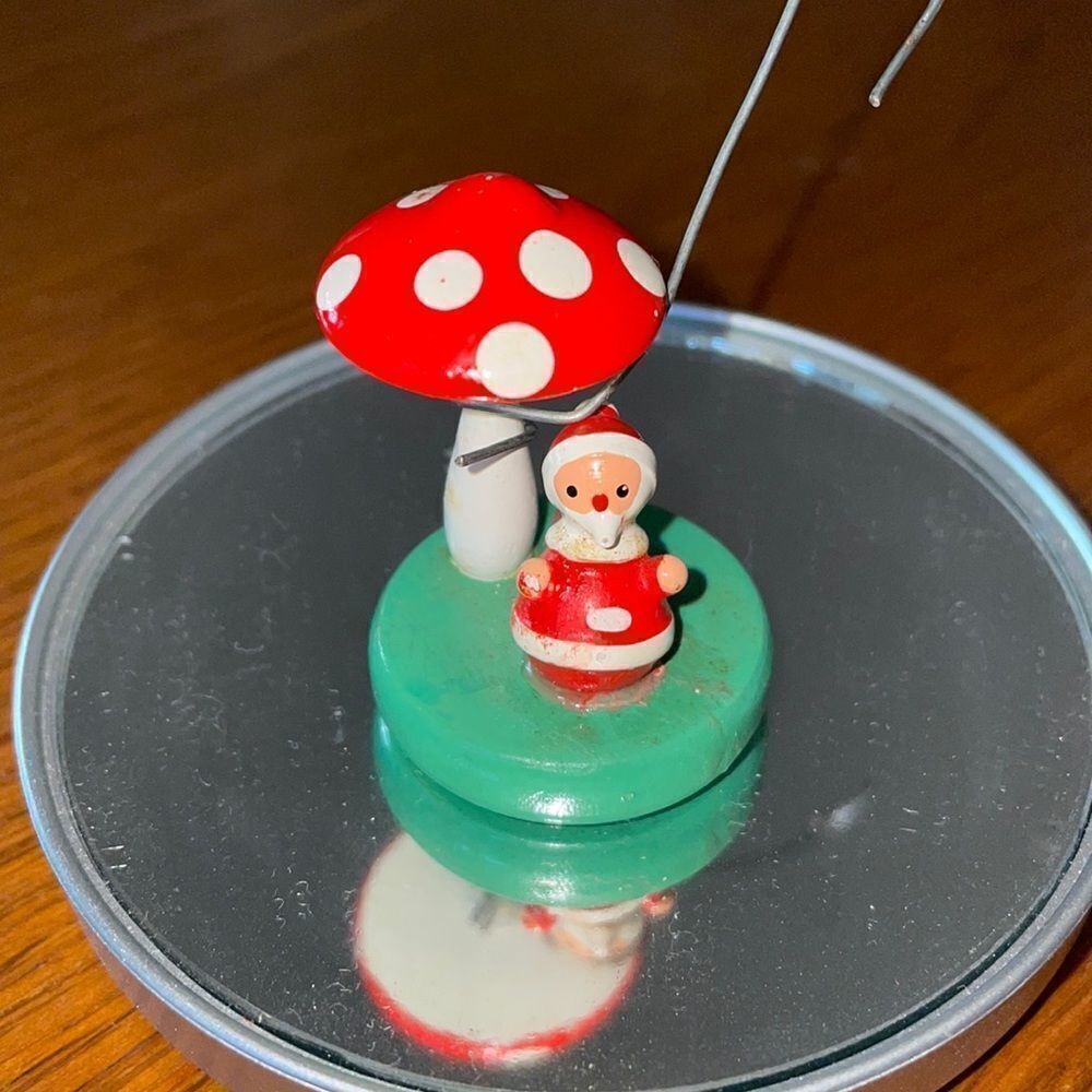 Tiny vintage Goula Spain wooden Santa under a toadstool
